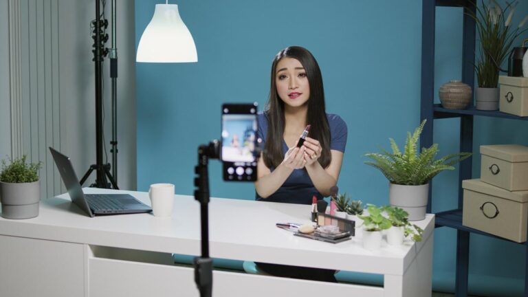 014874400_1758093848-content-creator-doing-product-review-camera-studio-filming-video-with-makeup-co.jpeg